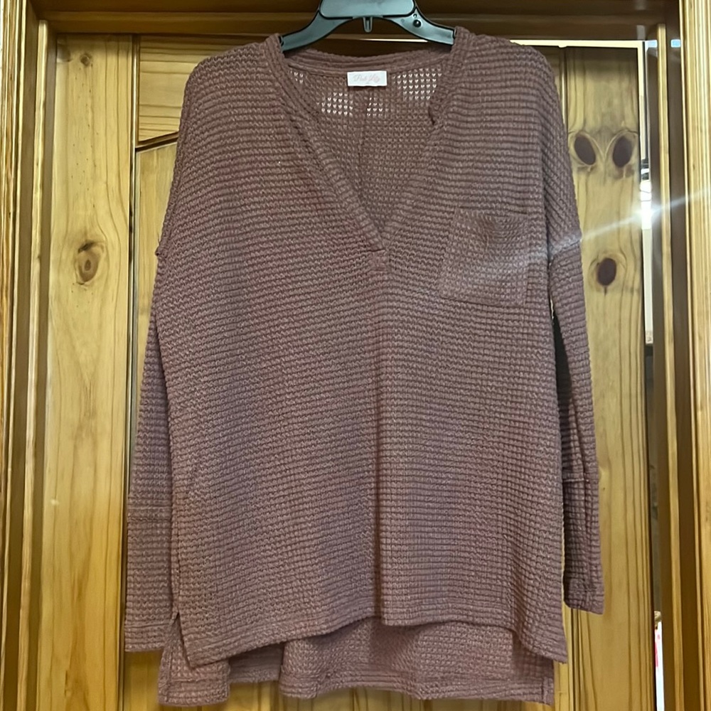 pink lily, purple/pink sweater, never worn